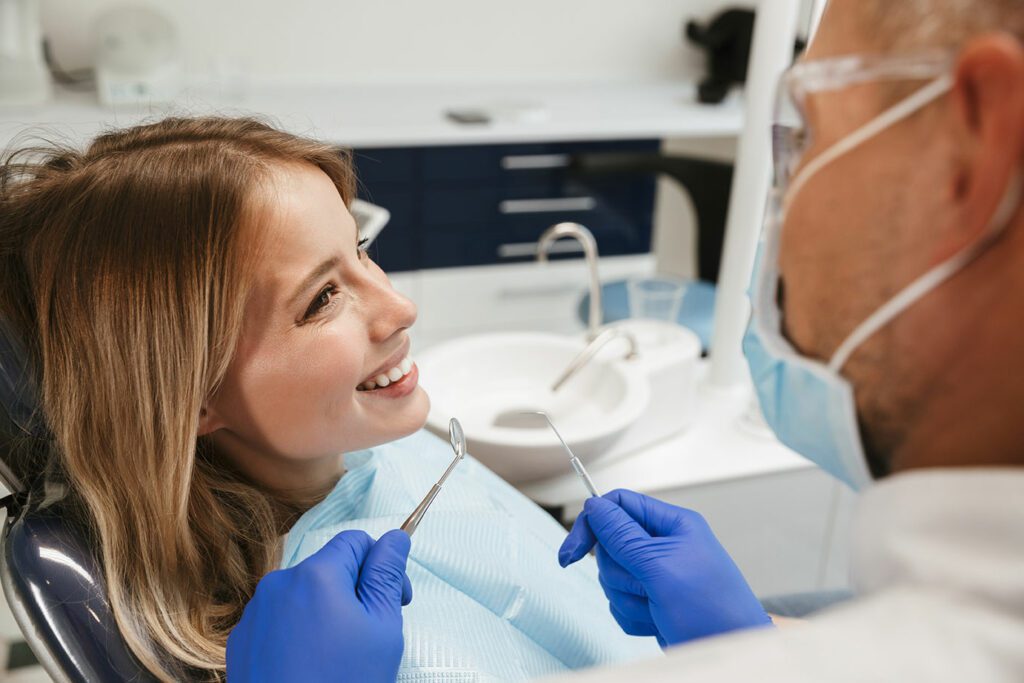 Smiling patient with Quincy Dentist